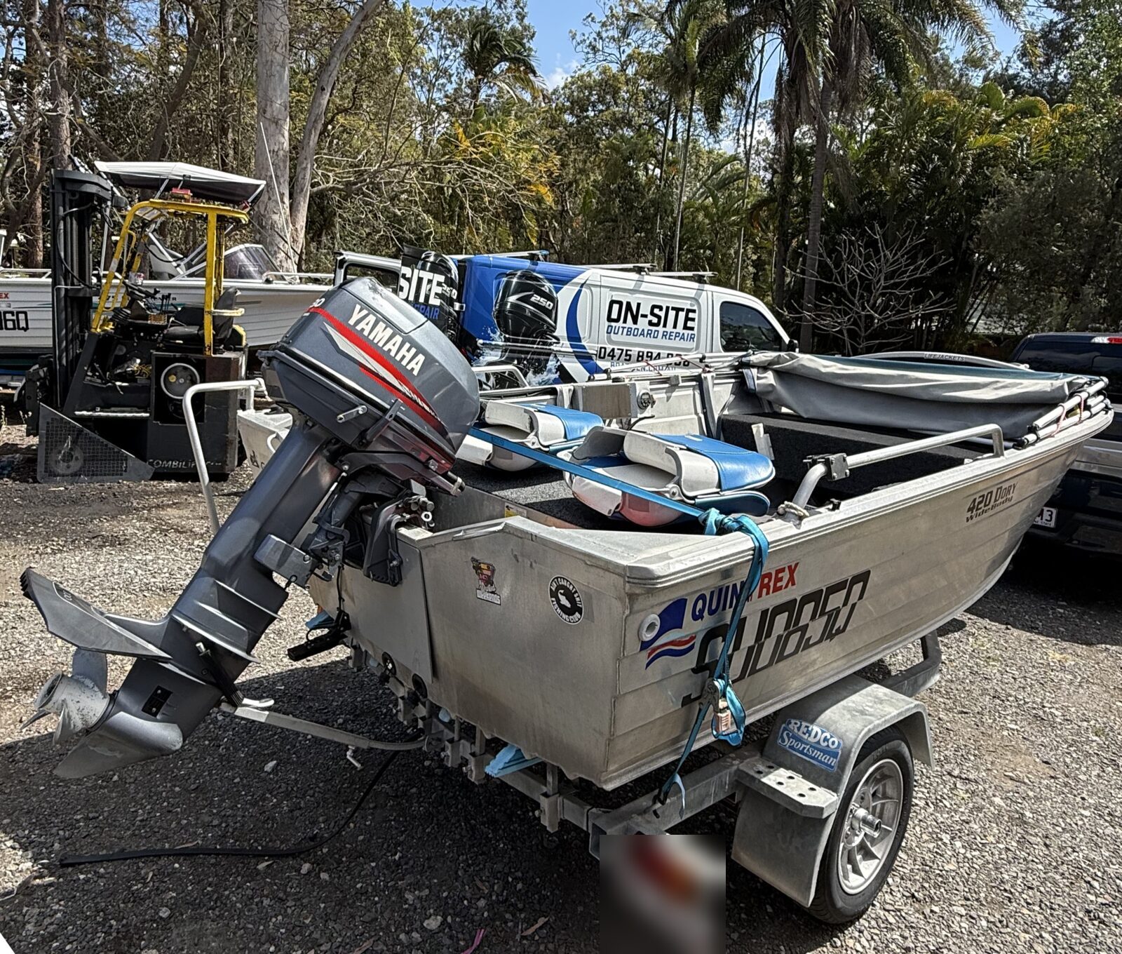 Quintrex 420 tinny with its old Yamaha outboard, before the repower